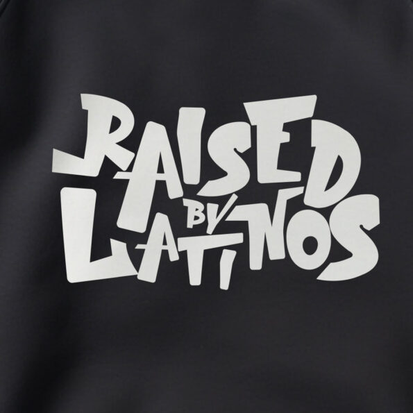 Champions latino streetwear hoodie with Raised by latinos text