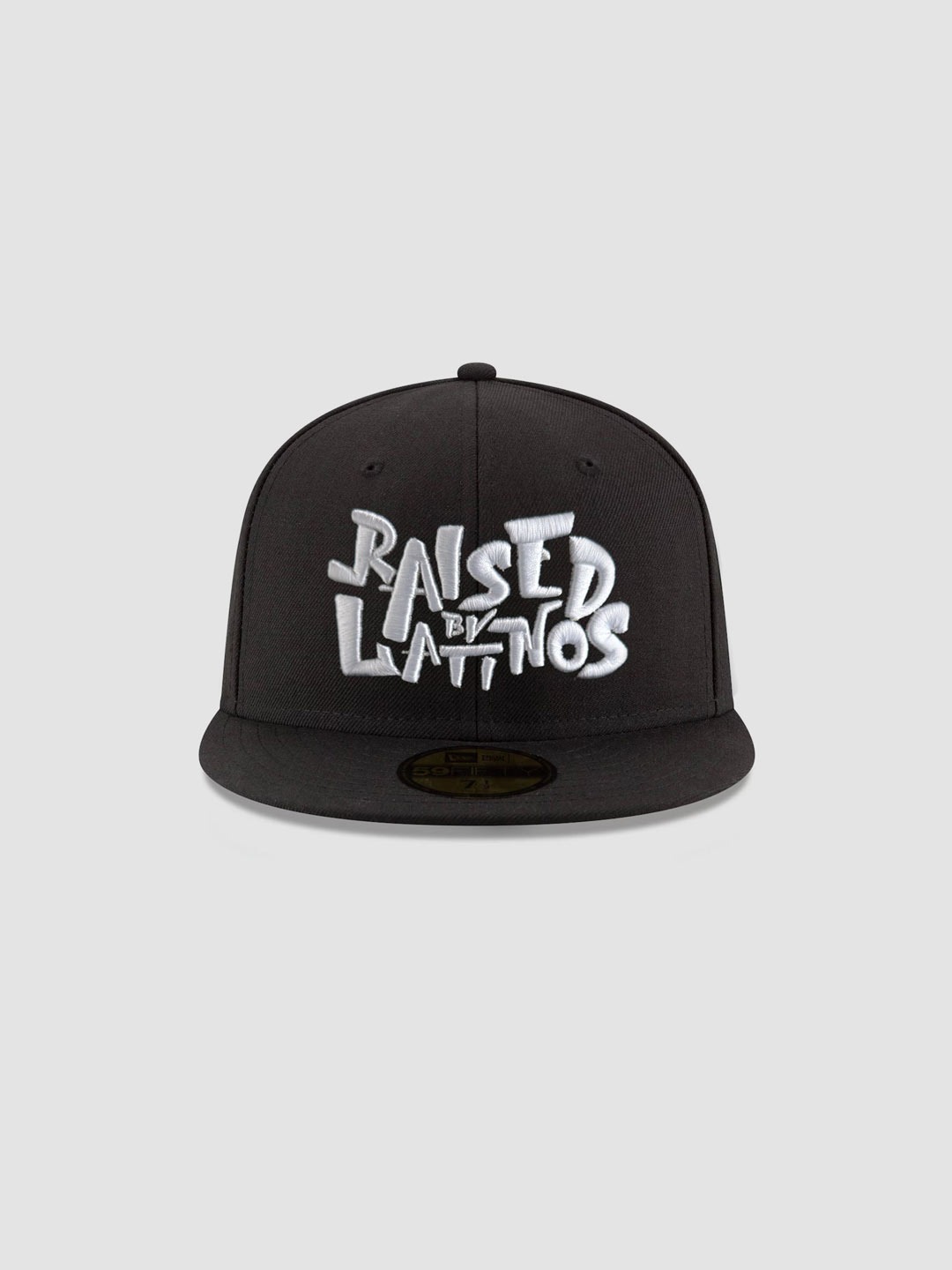 RBL Champions black cap with white graffiti-style RAISED BY LATINOS embroidery, front view